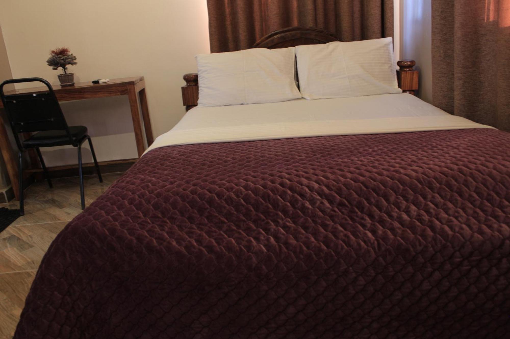 Mikocheni Condo Hotel & Apartments Dár Al-Szalám Kültér fotó